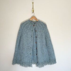 Hand-knit fringe poncho